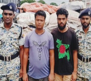 নগরে ভারতীয় ৫০ বস্তা চিনিসহ দুজন আটক